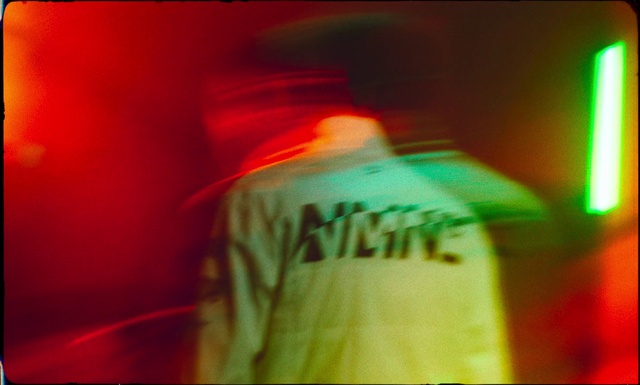 Video Reference: Outerwear, Sleeve, T-shirt, Entertainment, Font, Music, Magenta, Event, Rectangle, Visual effect lighting