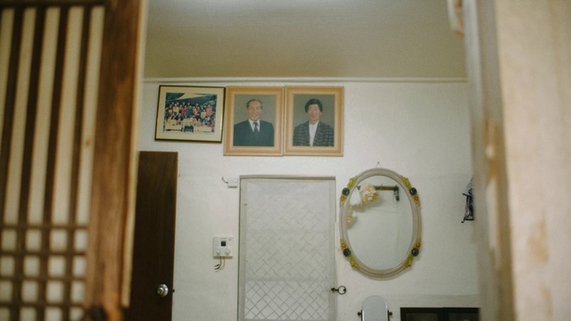 Video Reference: House, Picture frame, Wood, Door, Fixture, Home door, Room, Flooring, Ceiling, Paint