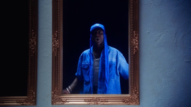 Video Reference: Blue, Rain suit, Sleeve, Purple, Electric blue, Wood, Cap, Magenta, Street fashion, Rectangle