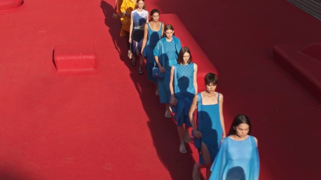 Video Reference: Blue, Dress, Red, T-shirt, Fashion design, Electric blue, Leisure, Event, Flooring, Entertainment