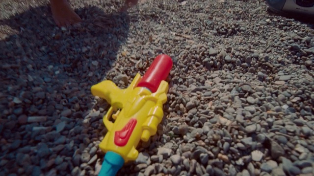 Video Reference: Toy, Soil, Plastic, Carmine, Grass, Font, Electric blue, Baby toys, Nail, Fun