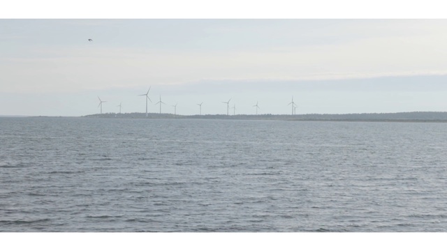 Video Reference: Water, Sky, Windmill, Wind farm, Fluid, Wind turbine, Atmospheric phenomenon, Liquid, Lake, Cloud