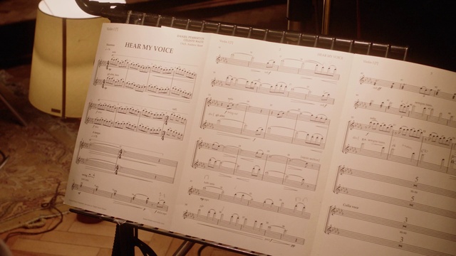 Video Reference: Font, Wood, Material property, Rectangle, Paper, Music, Document, Event, Paper product