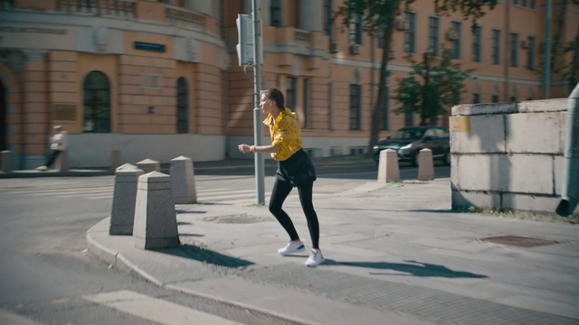 Video Reference: Window, Plant, Asphalt, Tree, Street fashion, Sidewalk, City, Thigh, Recreation, Exercise
