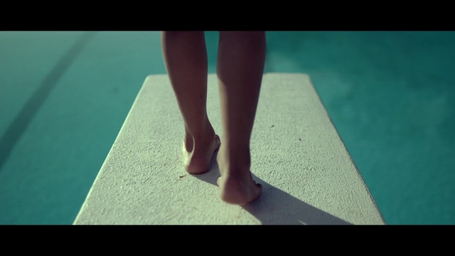 Video Reference: Gesture, Wood, Knee, Floor, Thigh, Flooring, Tints and shades, Calf, Hardwood, Grass