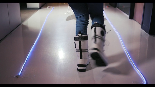 Video Reference: Shoe, Leg, Flooring, Floor, Audio equipment, Knee, Thigh, Sportswear, Sneakers, Electric blue