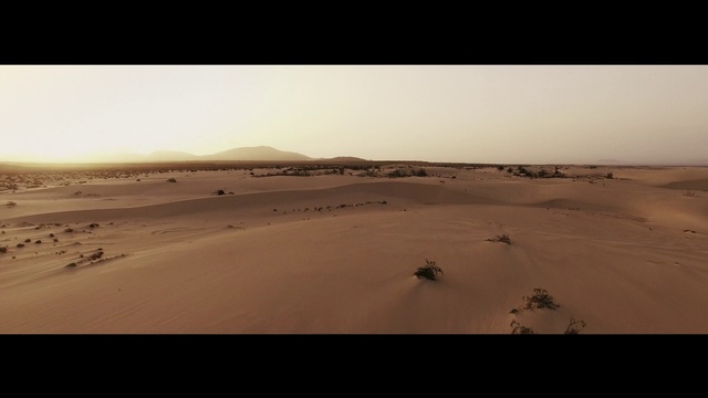 Video Reference: Sky, Cloud, Erg, Natural landscape, Terrain, Horizon, Plain, Singing sand, Mountainous landforms, Tints and shades
