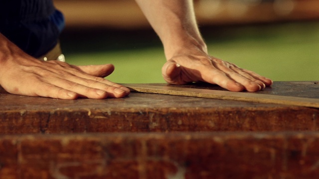 Video Reference: Hand, Arm, Wood, Human body, Gesture, Finger, Thumb, Wood stain, Floor, Nail