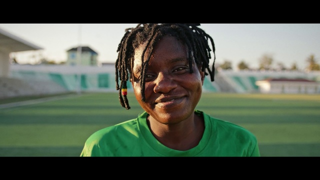 Video Reference: Head, Smile, Cornrows, Sky, Flash photography, Happy, Dreadlocks, Player, Grass, Black hair