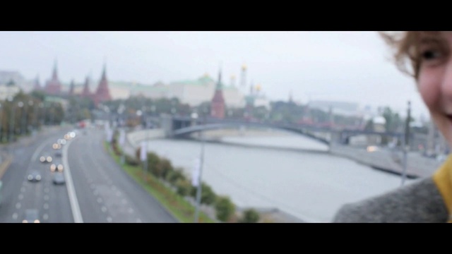 Video Reference: Sky, Water, Building, Urban design, Atmospheric phenomenon, Cityscape, Tower block, Road surface, Travel, Thoroughfare