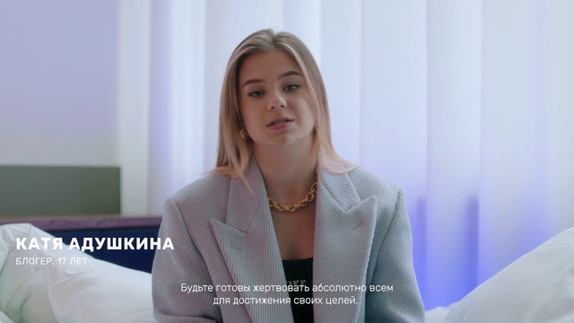 Video Reference: Hair, Outerwear, Shoulder, Neck, Fashion, Sleeve, Gesture, Blazer, Street fashion, White-collar worker