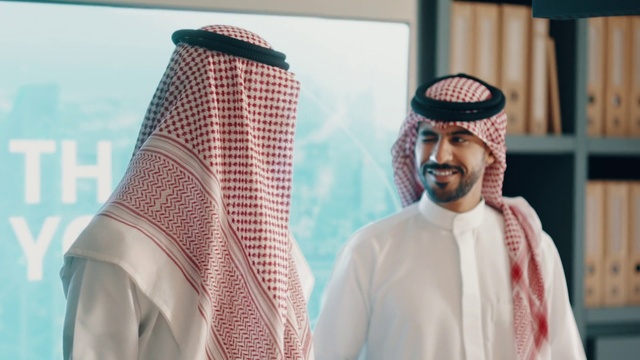 Video Reference: Beard, Smile, Headgear, Street fashion, Microphone, Turban, Happy, Fashion design, Facial hair, Event