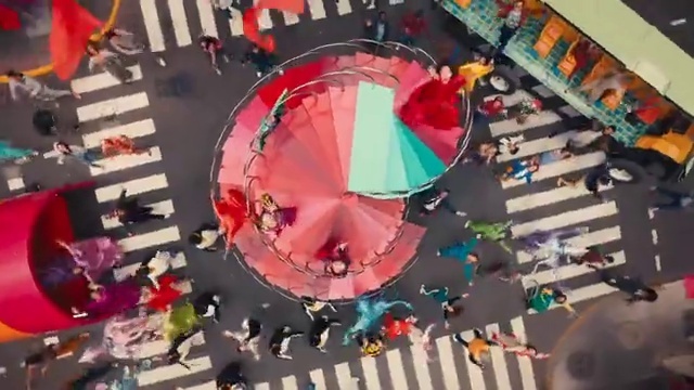 Video Reference: Urban design, Art, Leisure, Fun, Magenta, Automotive wheel system, Circle, Event, Recreation, Landscape