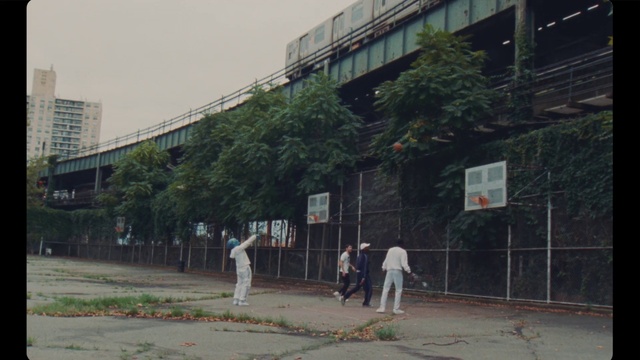 Video Reference: Building, Plant, Infrastructure, Sky, Urban design, Tree, Road surface, Morning, Road, Sidewalk