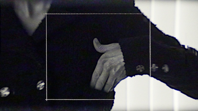 Video Reference: Sleeve, Gesture, Finger, Font, Rectangle, Glove, Wrist, Electric blue, Fashion accessory, Radiography