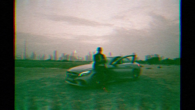 Video Reference: Sky, Car, Tire, Wheel, Vehicle, Cloud, Hood, Automotive lighting, Green, Automotive tire