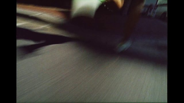 Video Reference: Automotive lighting, Wood, Tints and shades, Flooring, Rectangle, Darkness, Hardwood, Room, Human leg, Petal