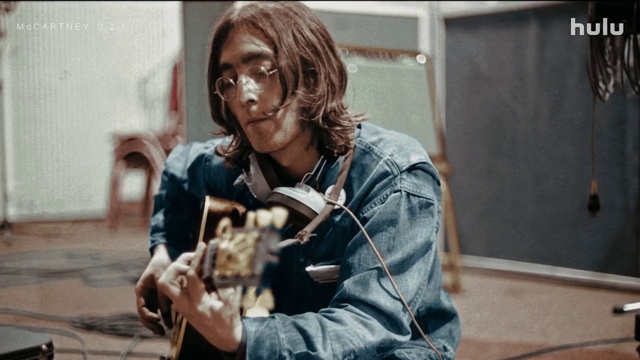 Video Reference: Musician, Street fashion, Audio equipment, Music, Eyewear, Camera, Plucked string instruments, Fur, Sitting, String instrument