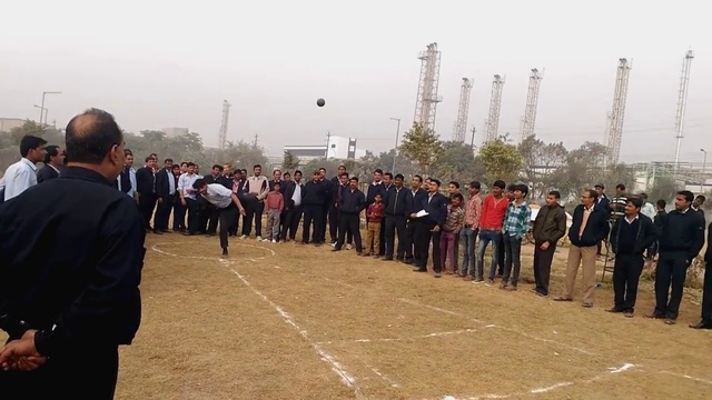 Video Reference: Trousers, Sky, Natural environment, Gesture, Social group, Public space, Morning, Crowd, Suit, Fun