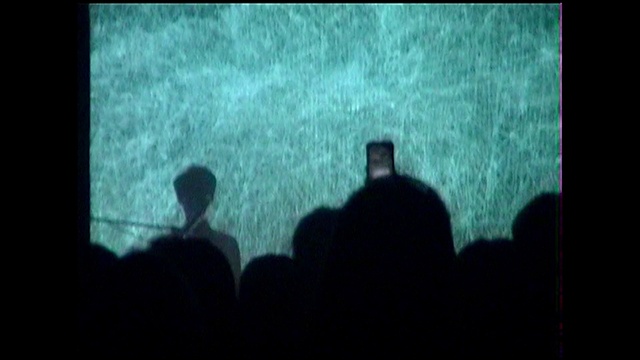 Video Reference: Water, Font, Rectangle, Entertainment, Technology, Projection screen, Display device, Event, Electric blue, Fun