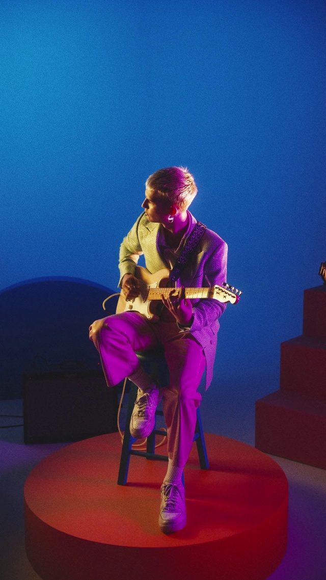 Video Reference: Purple, Musical instrument, Musician, Guitar, Artist, Pink, Music, Performing arts, Entertainment, String instrument