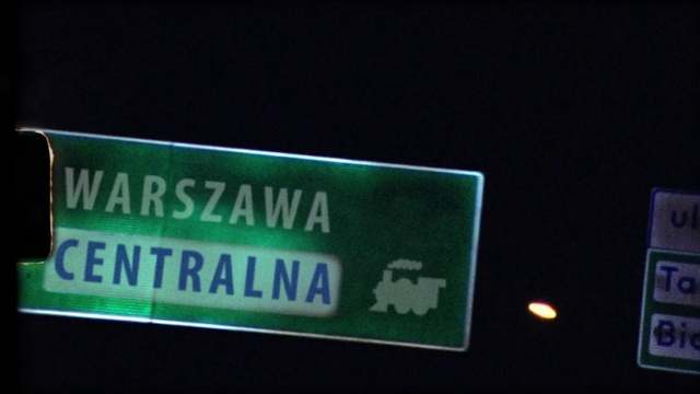 Video Reference: Rectangle, Font, Display device, Street sign, Signage, Event, Traffic sign, Electronic signage, Advertising, Brand