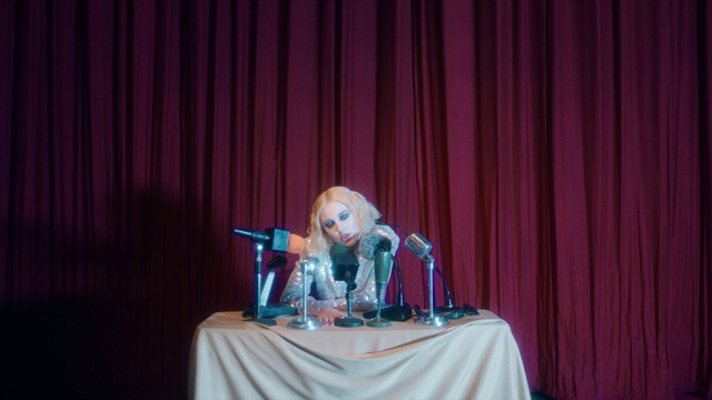Video Reference: Theater curtain, Table, Purple, Curtain, Toy, Entertainment, Performing arts, Magenta, Event, Performance art