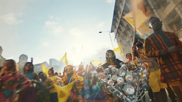Video Reference: Sky, Cloud, World, Natural environment, Flag, Fan, Fun, Leisure, Crowd, Event