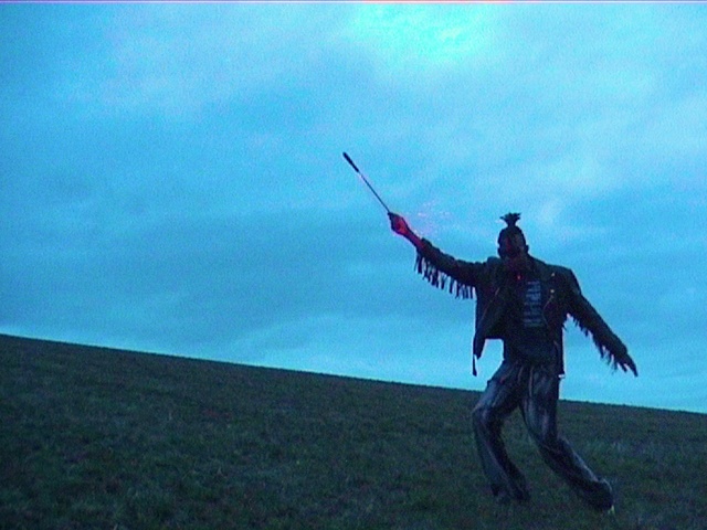 Video Reference: Sky, Cloud, Gesture, Shotgun, Art, Bow, People in nature, Sculpture, Grassland, Air gun