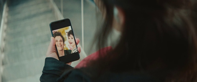 Video Reference: Hand, Mobile phone, Smile, Communication Device, Gesture, Telephony, Portable communications device, Gadget, Telephone, Mobile device