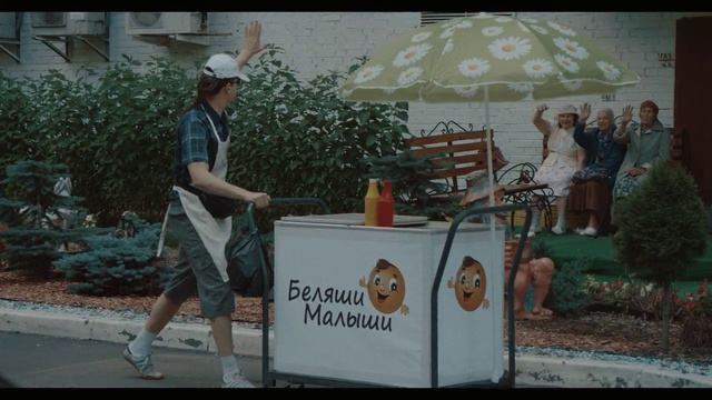 Video Reference: Plant, Shorts, Hat, Cap, Baseball cap, Fedora, Leisure, Umbrella, Event, Sun hat