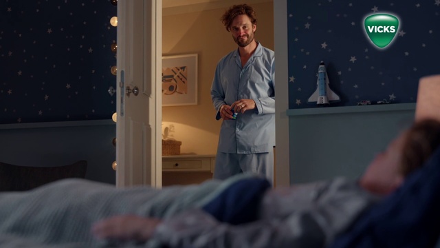 Video Reference: Joint, Comfort, Dress shirt, Standing, Gesture, Event, T-shirt, Pillow, Room, Conversation