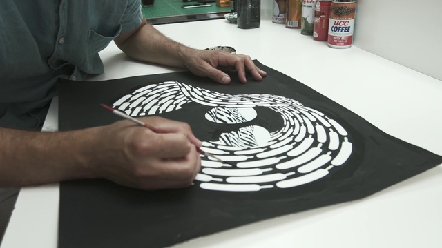 Video Reference: Hand, Table, Automotive design, Gesture, Finger, Art, Font, T-shirt, Recreation, Nail