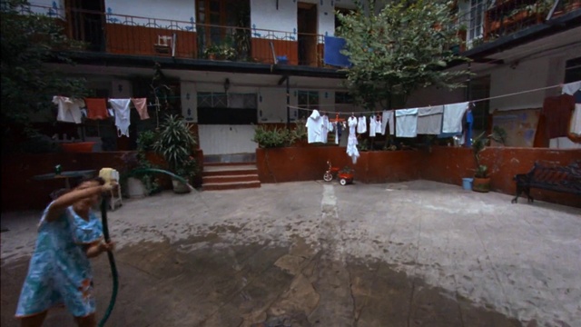 Video Reference: Window, Building, Tree, Leisure, Neighbourhood, City, Tire, Road surface, Event, Facade