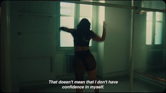 Video Reference: Gesture, Fixture, Window, Darkness, Backlighting, Door, Room, Elbow, Flash photography, Photo caption