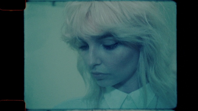 Video Reference: Eyebrow, Eyelash, Azure, Jaw, Rectangle, Art, Electronic device, Electric blue, Display device, Wig