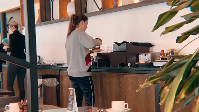 Video Reference: Plant, Wood, Cup, Kitchen, Houseplant, Shorts, Table, Tableware, Countertop, Cabinetry