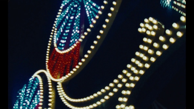 Video Reference: Font, Circle, Pattern, Electric blue, Neon, Event, Metal, Fashion accessory, Darkness, Art