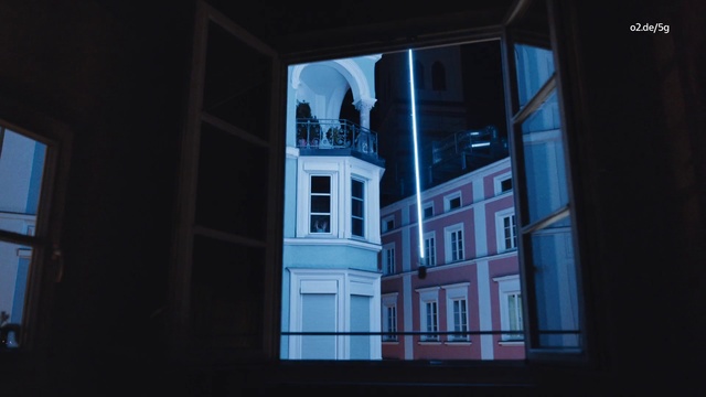 Video Reference: Window, Building, Rectangle, City, Midnight, Tints and shades, Electric blue, Facade, Font, Space