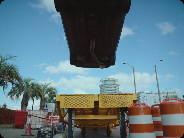 Video Reference: Sky, Cloud, Tire, Wheel, Vehicle, Asphalt, Architecture, Travel, Automotive tire, Motor vehicle
