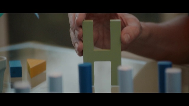 Video Reference: Wood, Gesture, Finger, Thumb, Font, Material property, Rectangle, Hardwood, Nail, Wrist