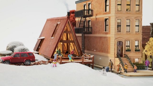 Video Reference: miniature, diorama, snow, winter, model buildings, apartment, cabin, red SUV, toy figures, snowman, street scene, stairs, balcony, urban, village