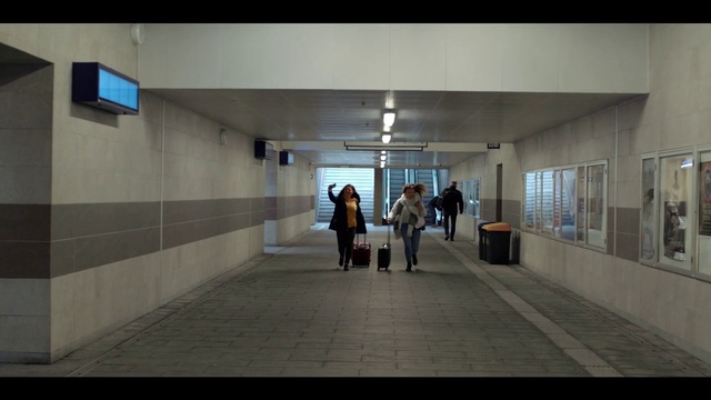 Video Reference: Fixture, Floor, Flooring, Television, Hall, City, Symmetry, Space, Event, Ceiling