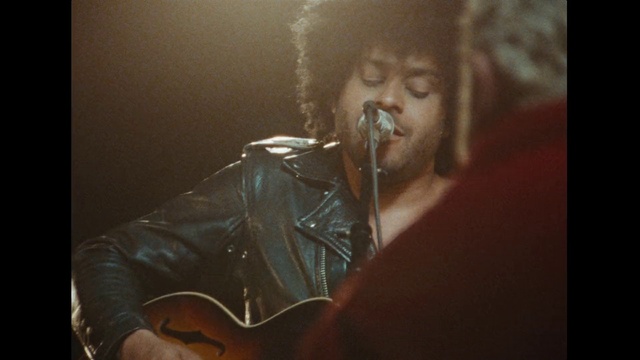 Video Reference: Microphone, Lip, Mouth, Musician, Concert, Guitar, Guitar accessory, Music, Music artist, String instrument accessory