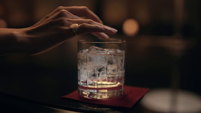 Video Reference: Drinkware, Liquid, Barware, Fluid, Gesture, Water, Highball glass, Drink, Alcoholic beverage, Old fashioned glass
