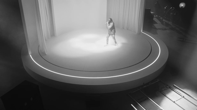 Video Reference: Hair, Building, Human body, Flash photography, Black-and-white, Style, Line, Entertainment, Monochrome photography, Monochrome