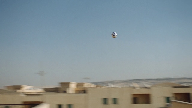 Video Reference: Sky, Building, Air travel, Windsports, Landscape, Window, Horizon, Wind, Air sports, Hot air balloon