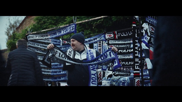 Video Reference: World, Hat, Flat panel display, Font, Display device, Sports uniform, Fan, Electronic device, Stage equipment, Smile