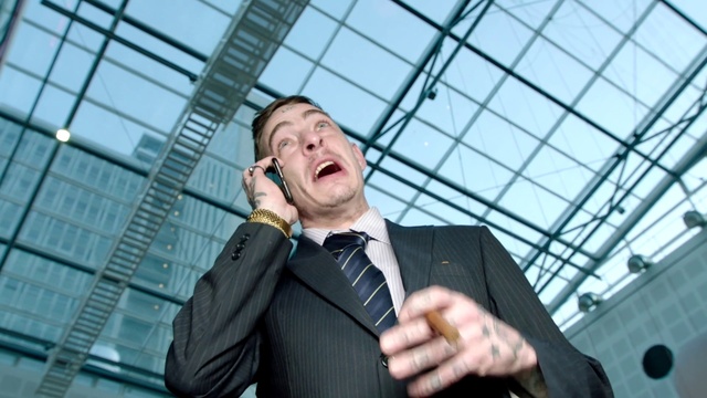 Video Reference: Dress shirt, Flash photography, Sky, Gesture, Tie, Suit, Happy, Audio equipment, White-collar worker, Blazer