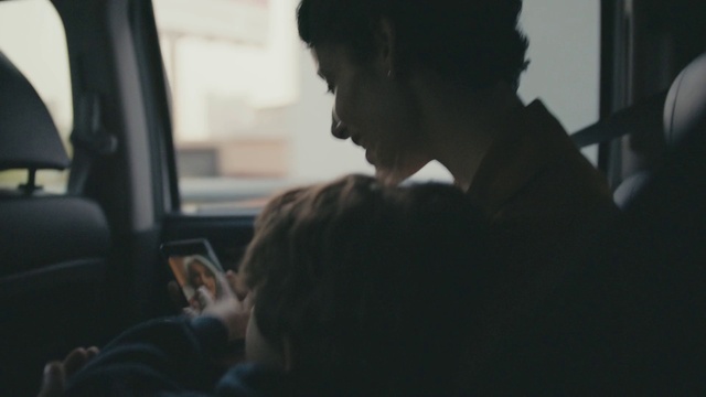 Video Reference: Gesture, Vehicle door, Darkness, Fun, Event, Family car, Head restraint, Passenger, Luxury vehicle, Steering wheel